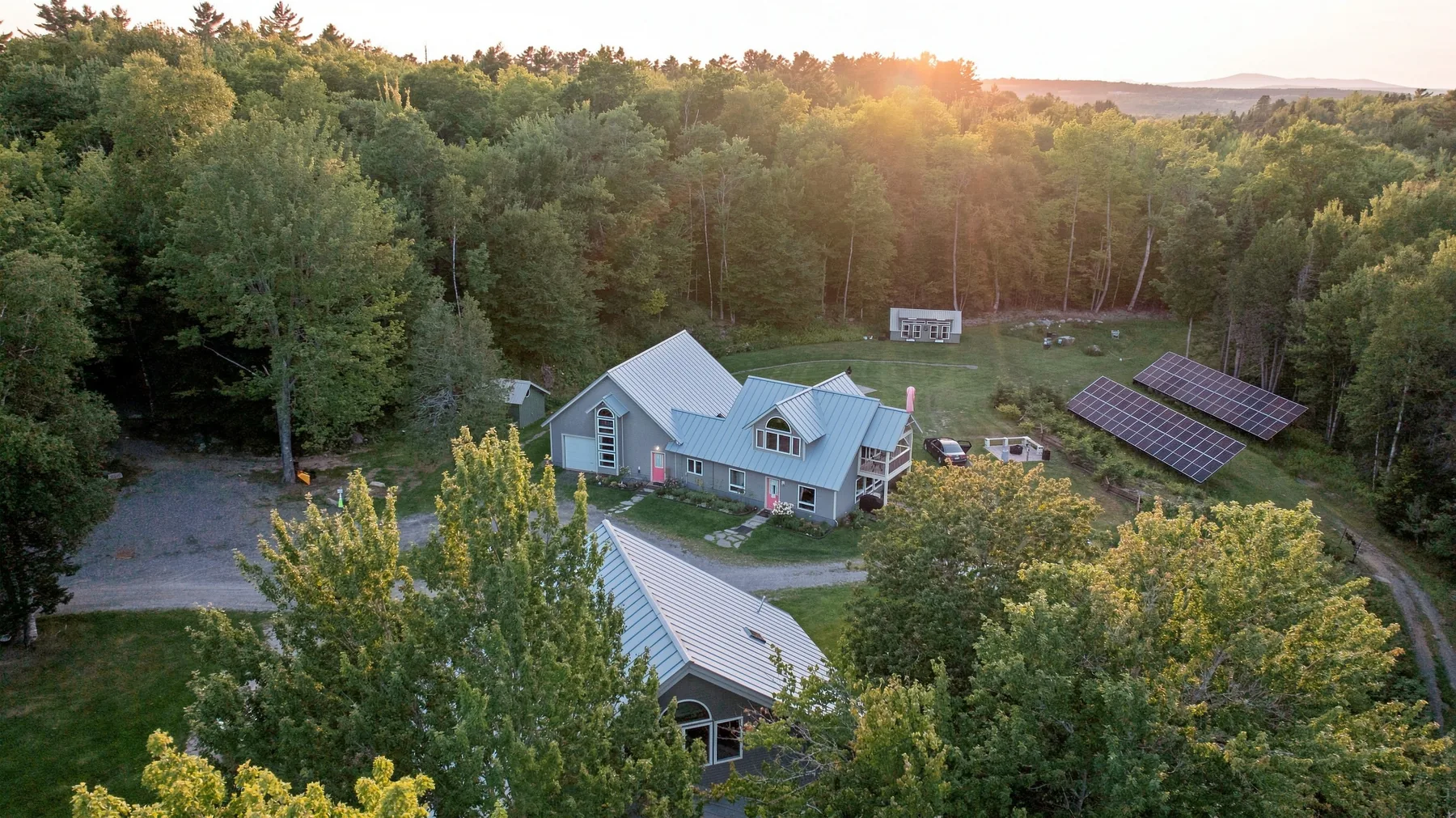 Aerial overview of the Dragonwood buildings, gardens, and solar array