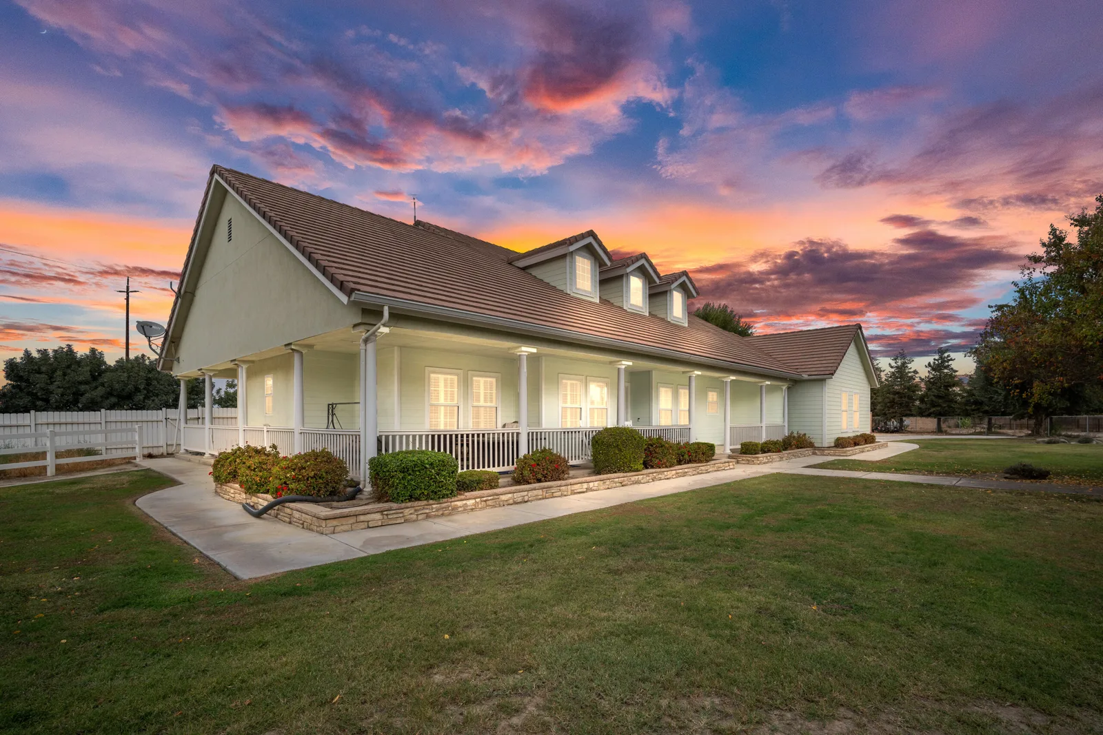 A luxury estate at sunset, the kind of media that builds a brand